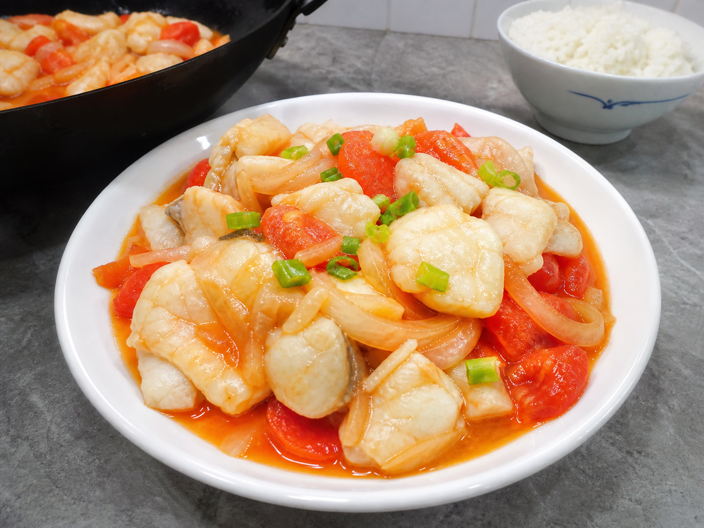 鮮茄洋蔥煮魚塊 Fish Pieces with Tomato and Onion Sauce