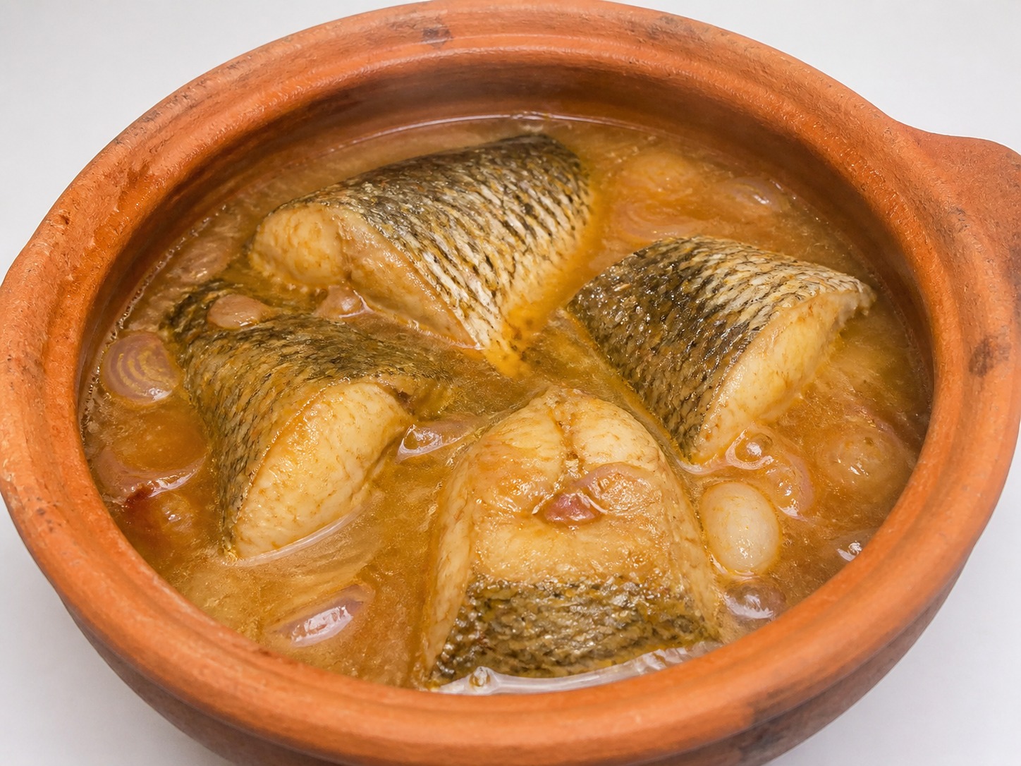 Ikan Karamel Claypot Vietnam — Tambah cairan