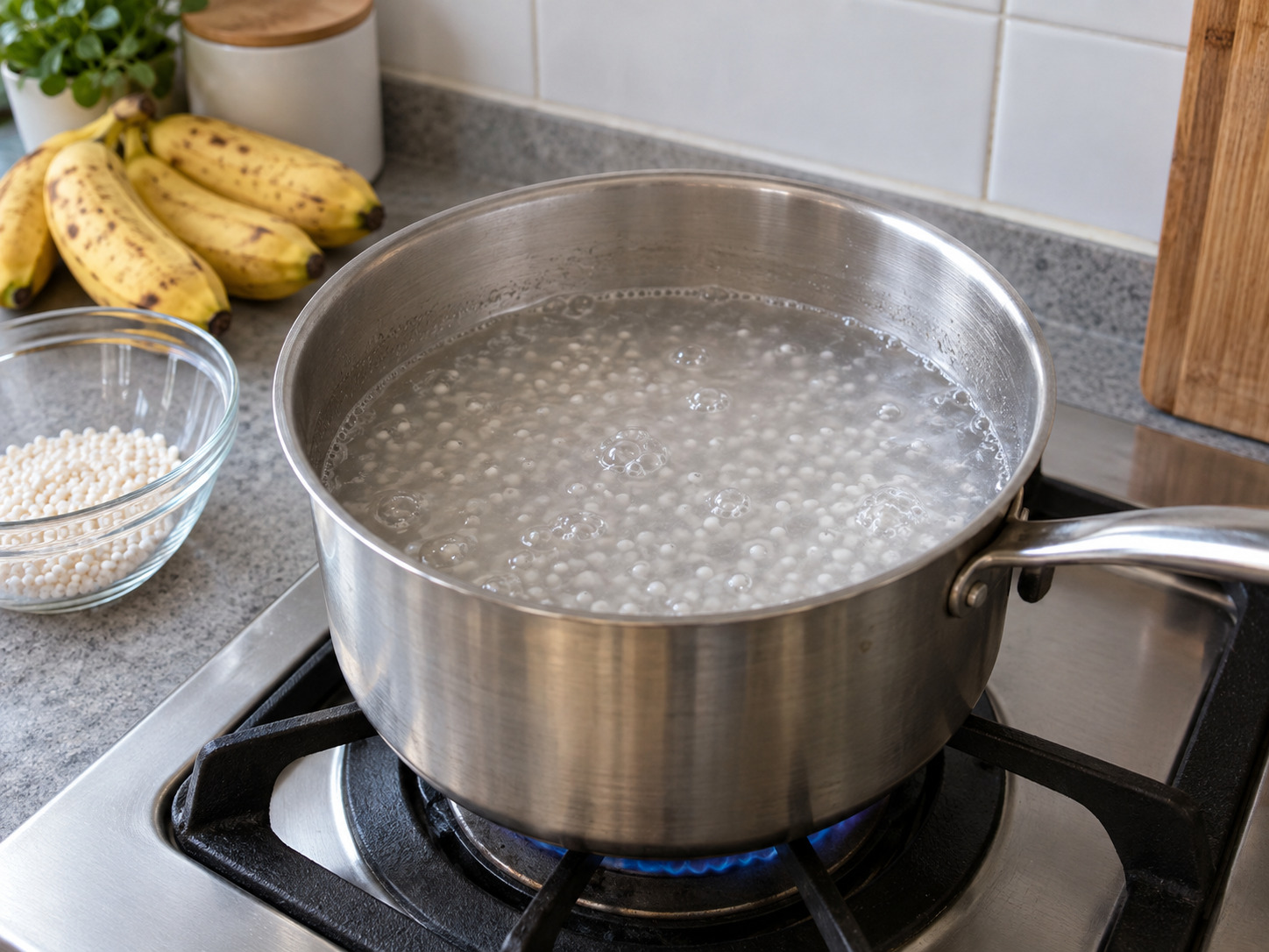 Vietnamese Che Chuoi Banana Coconut Dessert — Bring water to a boil and add tapioca