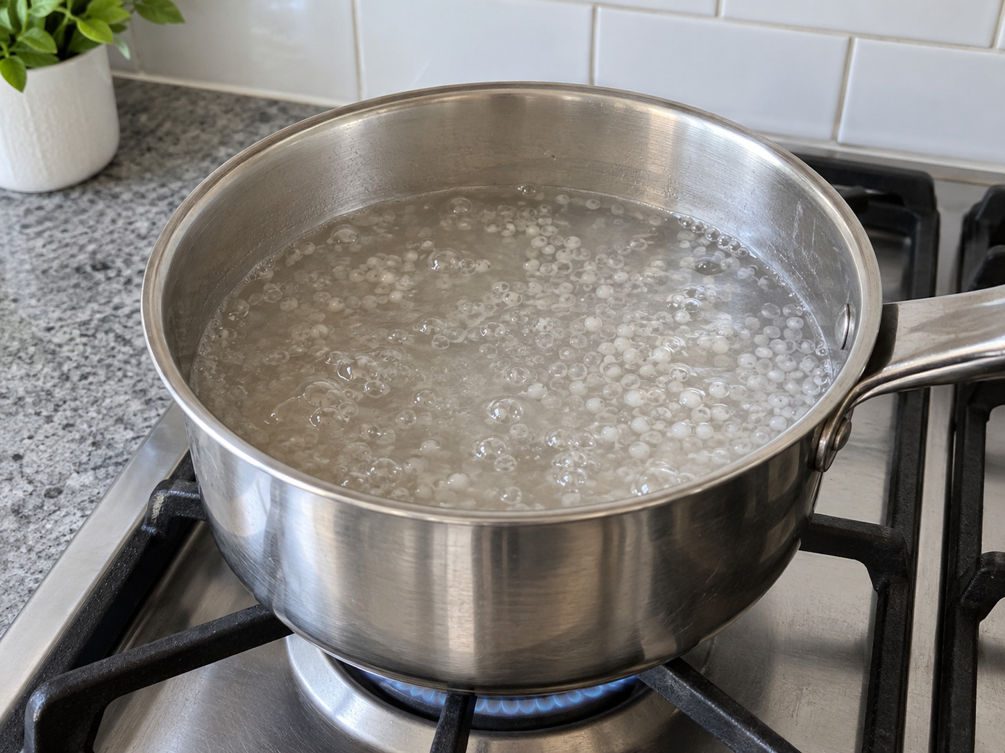 Vietnamese Che Chuoi Banana Coconut Dessert — Simmer until tapioca is mostly translucent