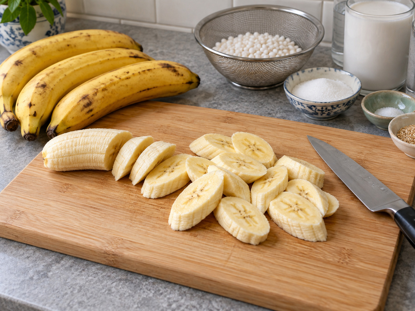Vietnamese Che Chuoi Banana Coconut Dessert — Peel bananas and cut thick diagonal slices