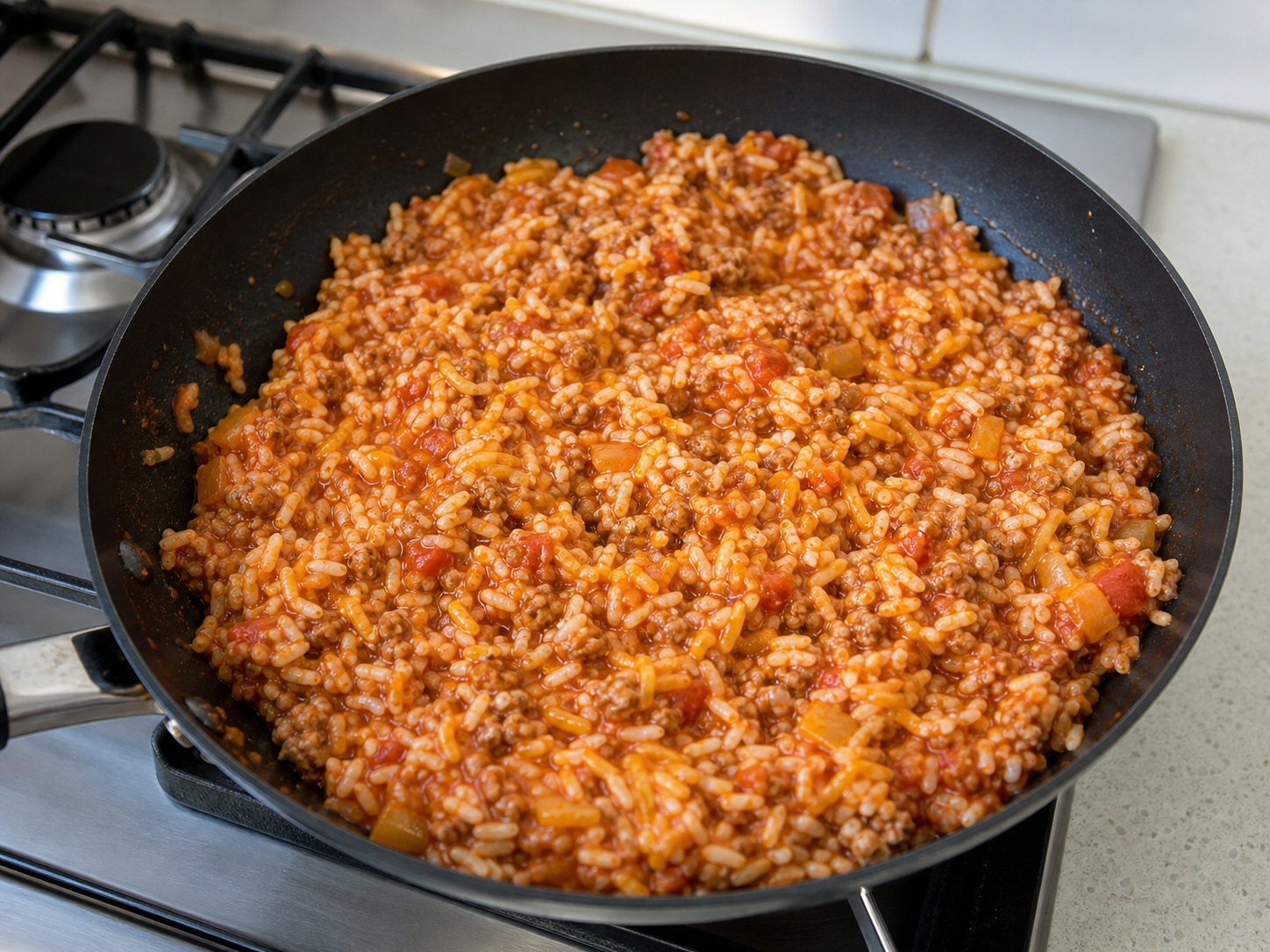 Western Baked Beef and Rice Stuffed Peppers: Fold in the rice